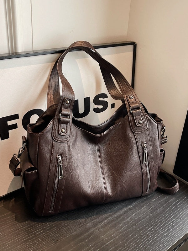 Borsa tote alla moda con rivetti di alta gamma e grande capacità