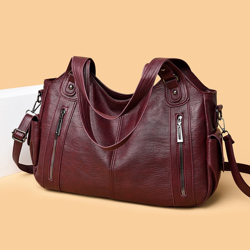 Borsa tote alla moda con rivetti di alta gamma e grande capacità