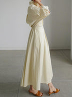 Abito Midi Elegante con Colletto a Revers e Bottoni