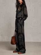 Lorella | Completo di Camicia a Maniche Lunghe in Satin con Stampa Nero e Pantaloni a Gamba Larga